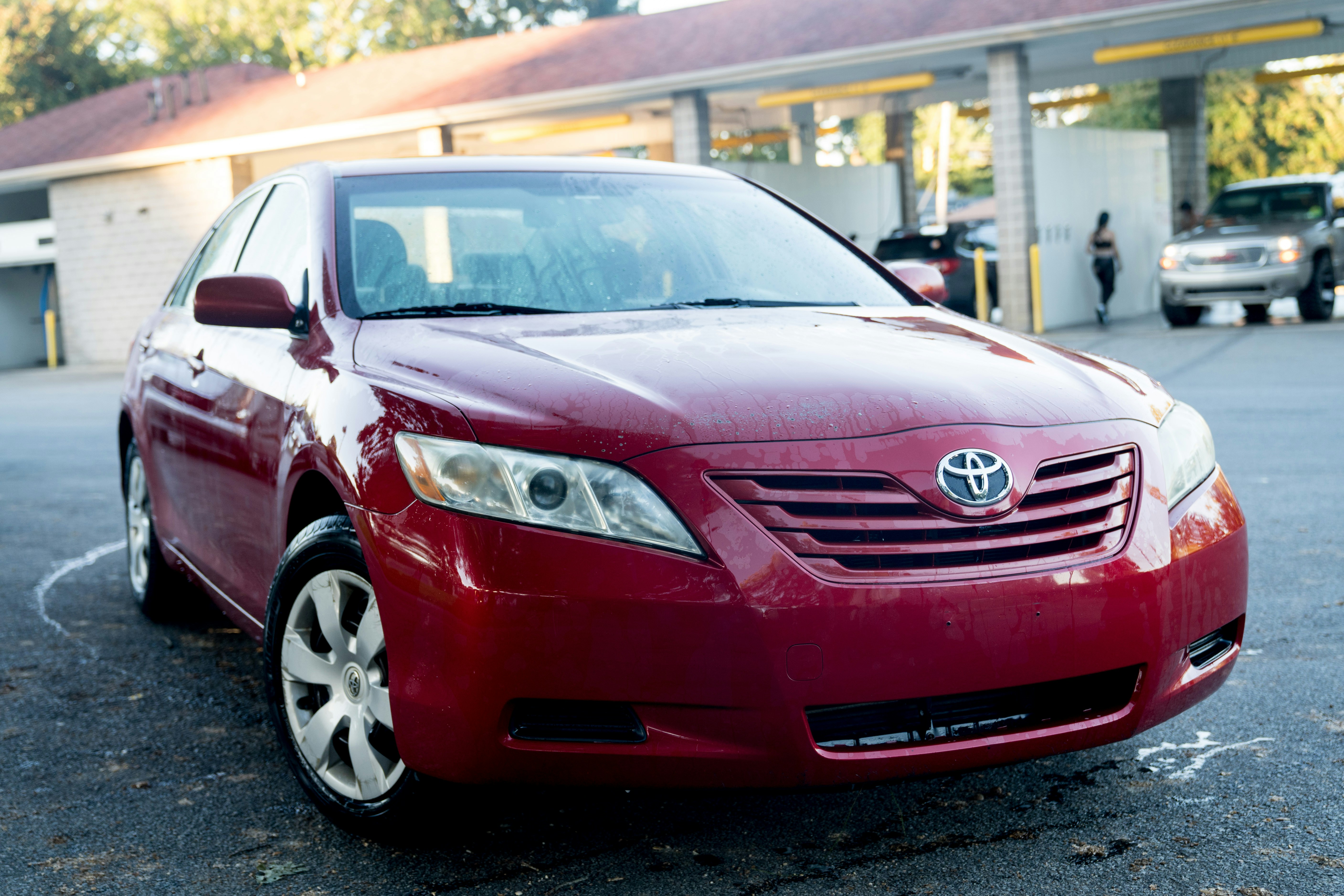 Red Toyota Camry sedan